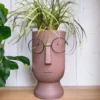 designer ceramic pots with goggle